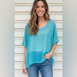 Aqua turquoise short sleeved sheer, high low blouse, size Small